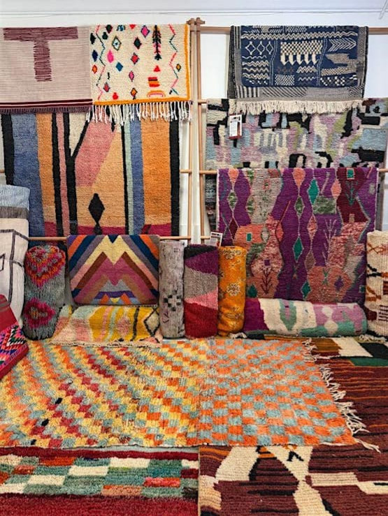 Checkered rugs on the floor in Kantara's Rug Room