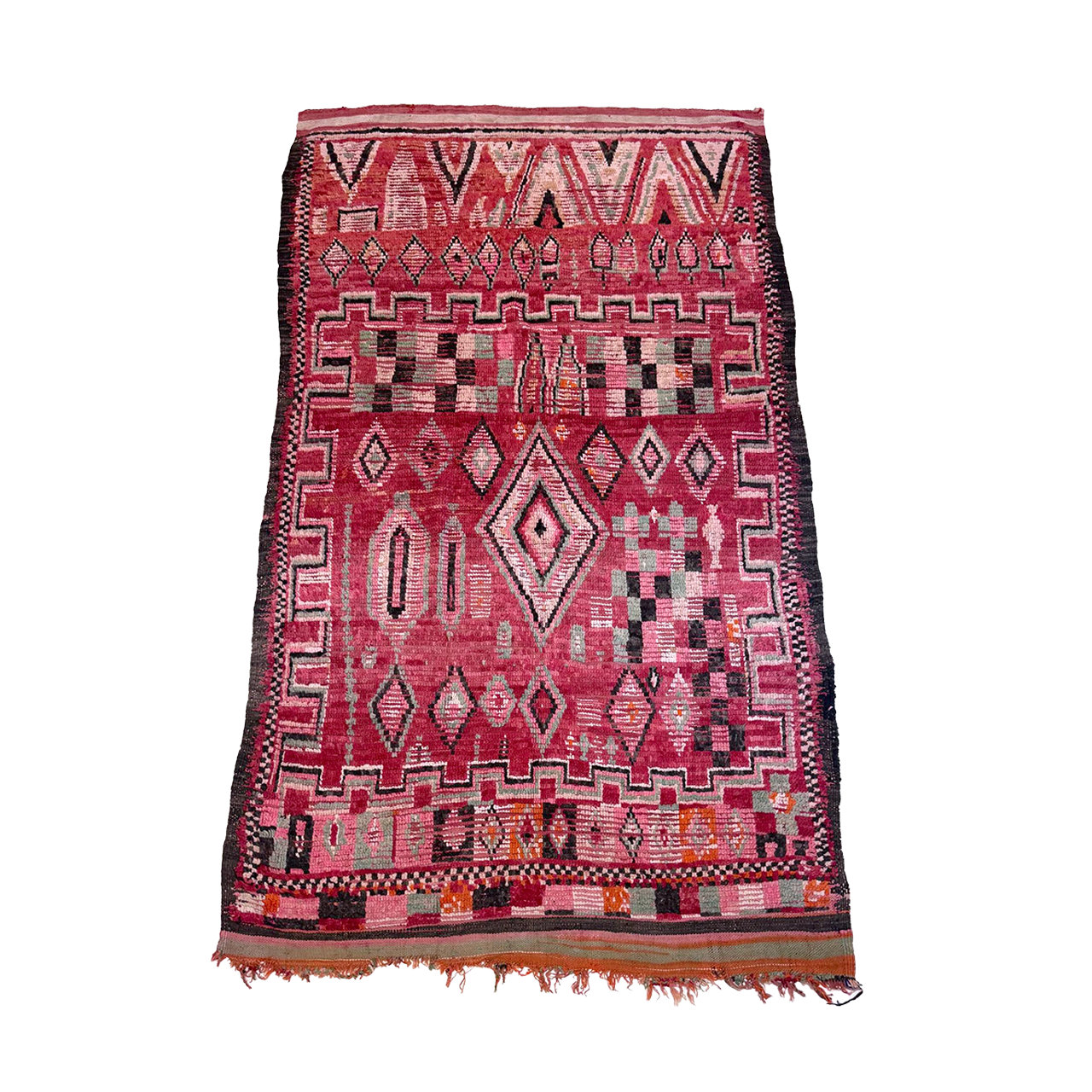 Pink low pile Moroccan rug with lots of colorful diamond designs